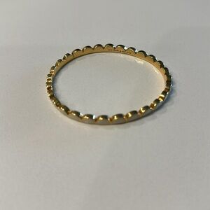 Kate Spade New York cream with gold accents scallop bangle